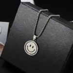 Vintage Titanium Stainless Steel Smiley Mood Face Rotatable Anxiety Pendant