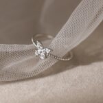 Elegant Silver Plated Zirconia Butterfly Twist Adjustable Ring (Size 7-9)